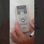 Programación de instrucciones para el mando de aire acondicionado General Electric